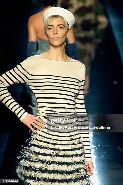 Model walks down the catwalk during the Jean-Paul Gaultier Retro Fashion Show as part of Paris Fashion Week Spring/Summer 2007 on October 3, 2006 in...