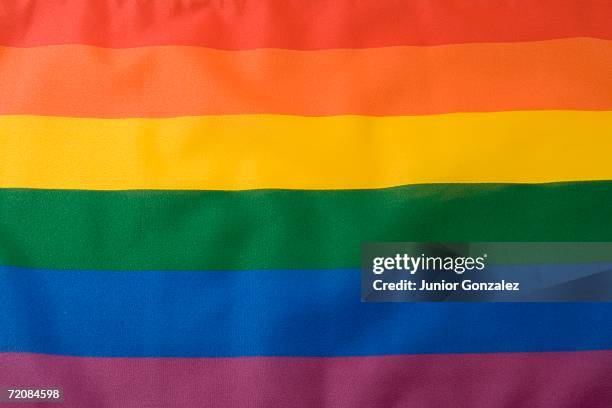 rainbow flag - rainbow flag stock-fotos und bilder