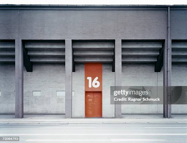 building exterior with number above door - film or television studio stock pictures, royalty-free photos & images