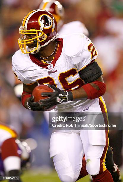 Clinton Portis of the Washington Redskins runs with the ball against the Minnesota Vikings on September 11, 2006 at FedExField in Landover, Maryland....