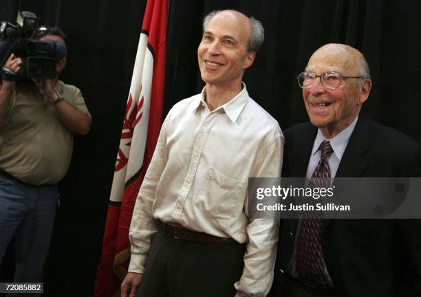 Stanford University professor Roger Kornberg and his father Arthur Kornberg , who won the Nobel Prize in 1959 for medicine, pose for a photo after a...