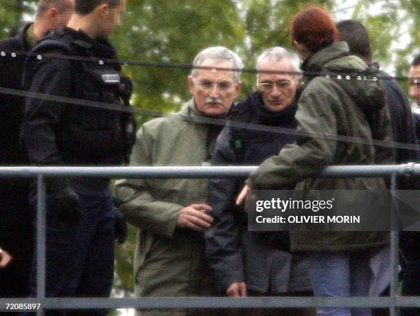 Montigny-les-Metz, FRANCE: Convicted serial killer Francis Heaulme is pictured next to Metz state prosecutor Joel Guitton during a reenactment, 03...