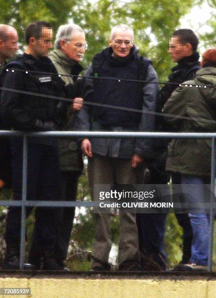 Montigny-les-Metz, FRANCE: Convicted serial killer Francis Heaulme is pictured next to Metz state prosecutor Joel Guitton during a reenactment, 03...