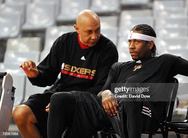 Henry Bibby talks with Allen Iverson of the Philadelphia 76ers at practice during NBA Europe Live presented by EA Sports on October 4 at the Palau...