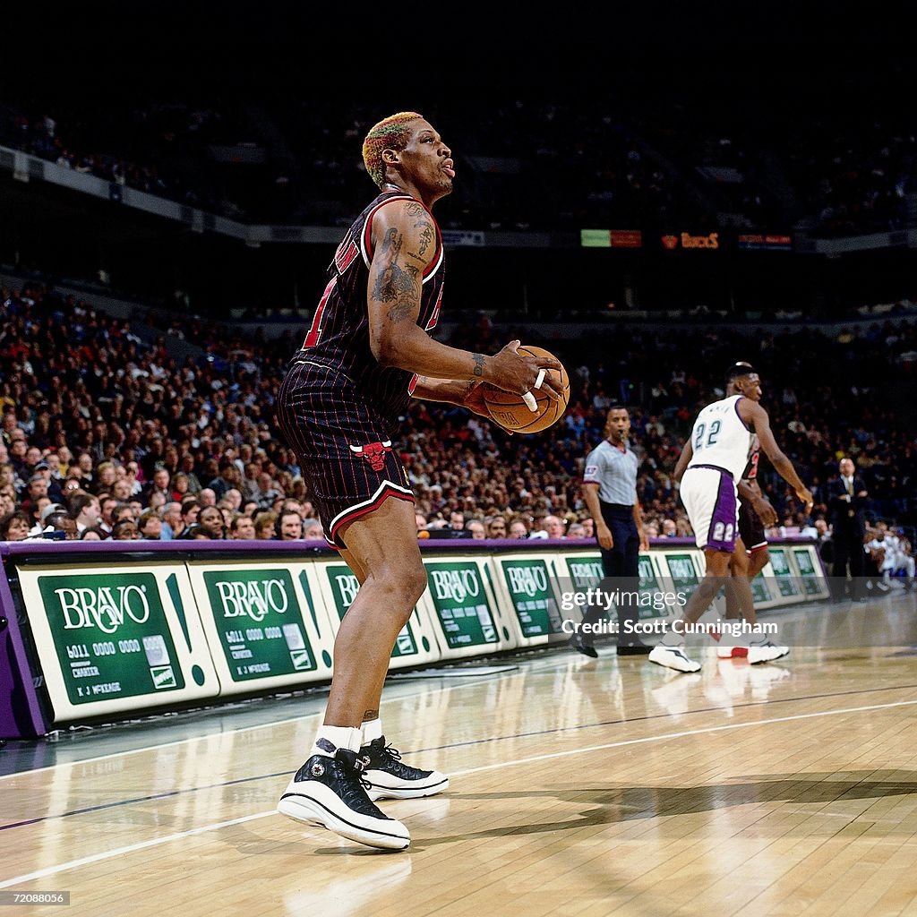 Dennis Rodman of the Chicago Bulls looks to shoot during a game