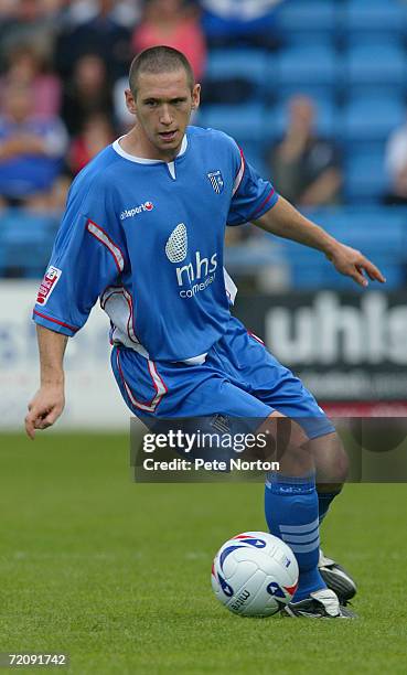 Andrew Crofts of Gillingham in action during the Coca Cola League One match between Gillingham and Northampton Town at Priestfield Stadium on August...