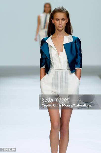 Model walks down the catwalk during the Akris Fashion Show as part of Paris Fashion Week Spring/Summer 2007 on October 4, 2006 in Paris, France.