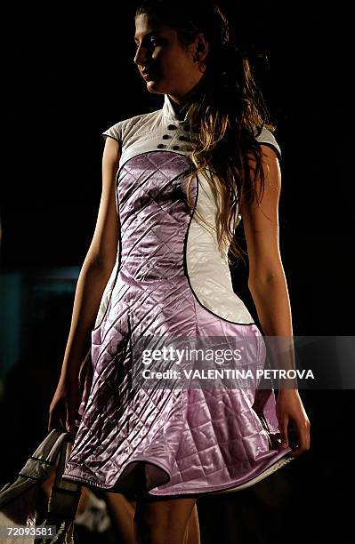 Model presents a creation by a Bulgarian student designer as part of her graduation project during a fashion show 05 October 2006. AFP PHOTO /...