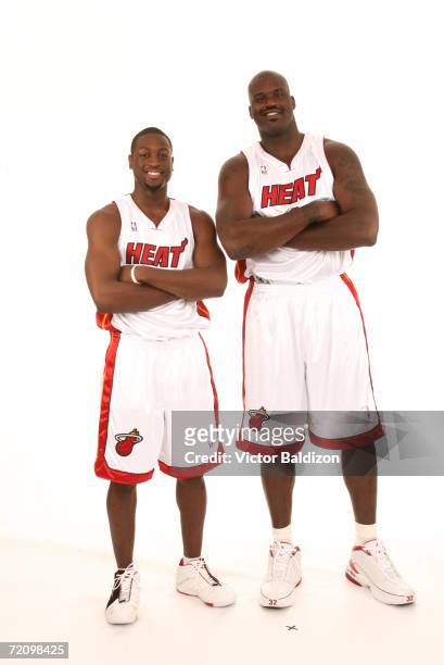 Shaquille O'Neal and Dwyane Wade of the Miami Heat pose for a portrait during NBA Media Day on October 2, 2006 at American Airlines Arena in Miami,...