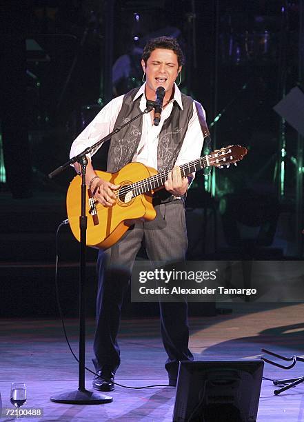 Singer Alejandro Sanz performs during the grand opening of the Carnival Center for the Performing Arts on October 5, 2006 in MIami, Florida.