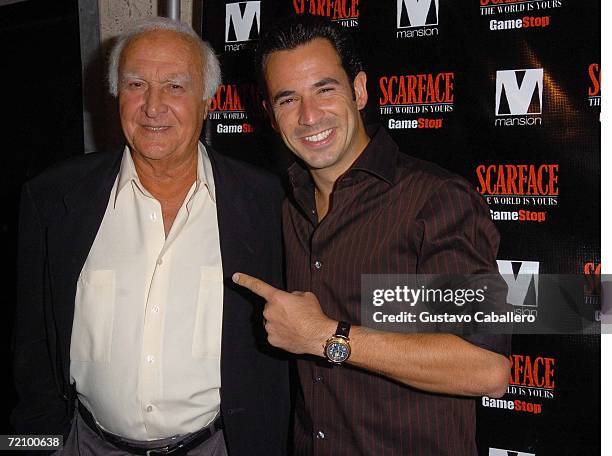 Robert Loggia and Helio Castroneves arrive at the "Scarface: The World Is Yours" video game premiere on October 5, 2006 in Miami Beach, Florida.