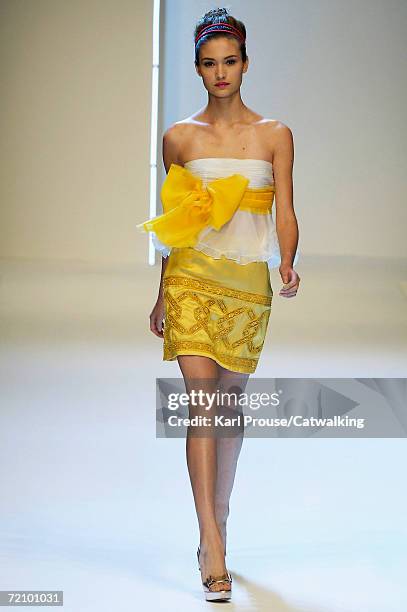 Model walks down the catwalk during the Valentino Fashion Show as part of Paris Fashion Week Spring/Summer 2007 on October 4, 2006 in Paris, France.