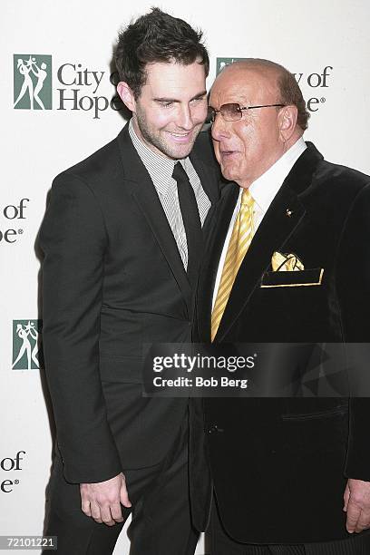 Maroon 5 singer Adam Levine and Sony BMG president Clive Davis arrive at the City Of Hope Dinner Honoring Charles Goldstuck October 5, 2006 at the...