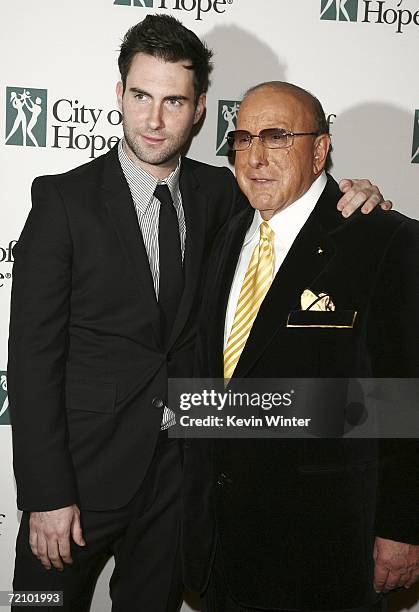 Maroon 5 singer Adam Levine and music executive Clive Davis pose at City of Hope's Spirit of Life Award Gala at the Pacific Design Center on October...