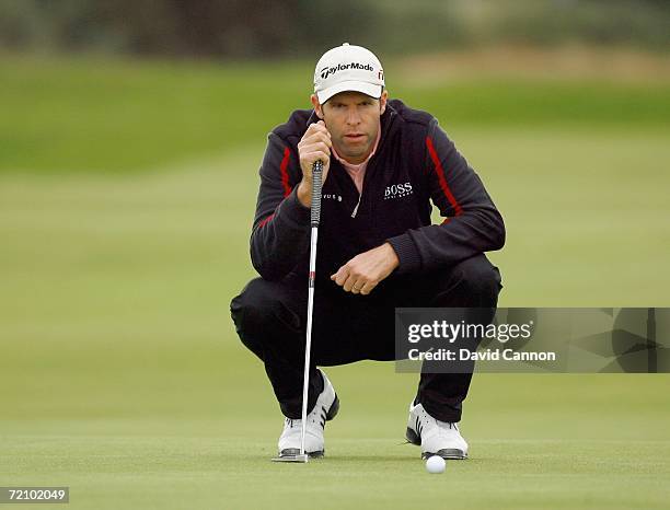 Bradley Dredge of Wales lines up his putt for par at the 16th hole during the second round of the Alfred Dunhill Links Championship at Carnoustie, on...