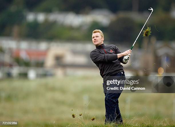 Ronan Keating of Ireland hits his third shot at the par 4, second hole during the second round of the Alfred Dunhill Links Championship at...