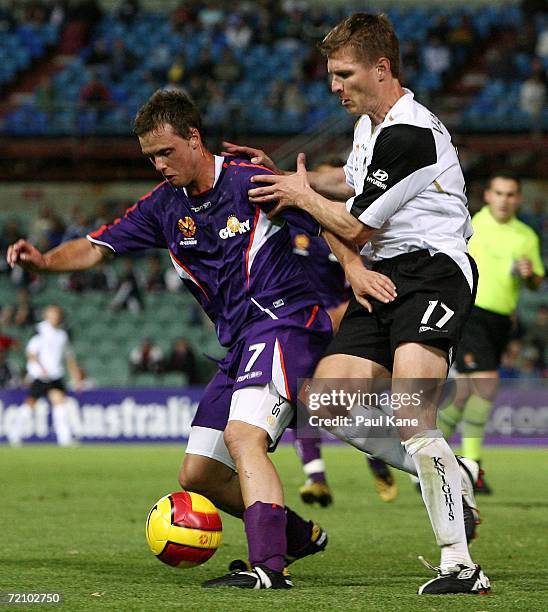 Mislav Saric of the Glory and Frank van Ejis of the Knights contest the ball during the round seven Hyundai A-League match between Perth Glory and...