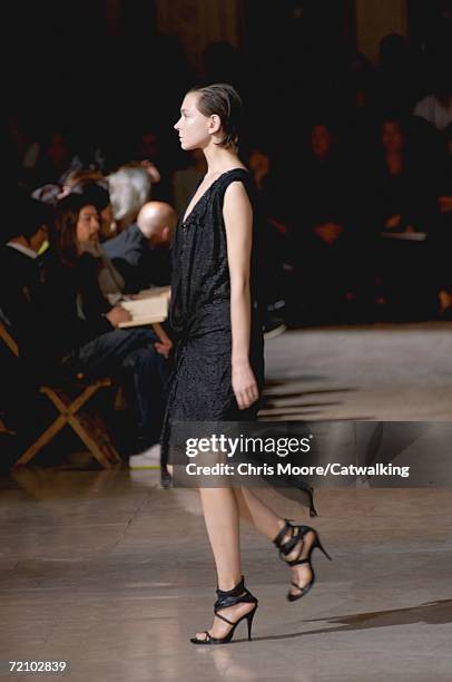 Model walks down the catwalk during the Haider Ackermann Fashion Show as part of Paris Fashion Week Spring/Summer 2007 on October 6, 2006 in Paris,...