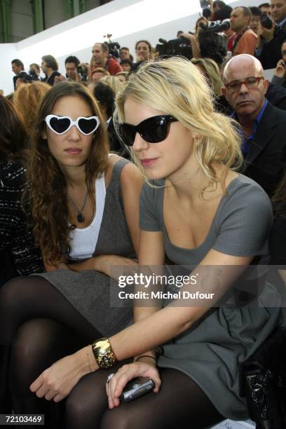 Tatiana Santo Domingo and Eugenia Niarchos attend the Chanel Fashion Show, as part of Paris Fashion Week Spring/Summer 2007 on October 6, 2006 in...