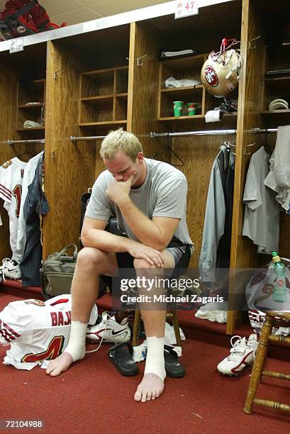 Billy Bajema of the San Francisco 49ers concentrates in the locker room before the game against the Kansas City Chiefs at Arrowhead Stadium on...