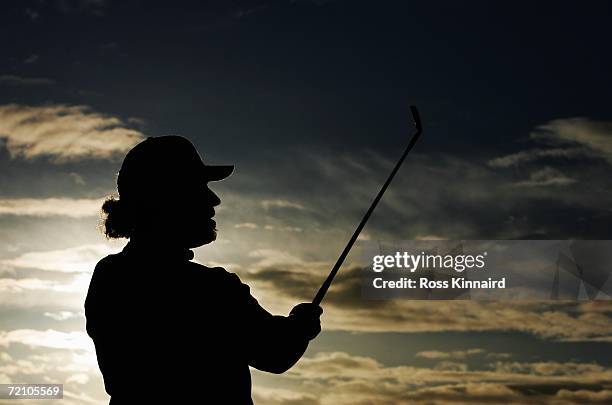 Miguel Angel Jimenez of Spain hits balls on the practice range after competing in the Second Round of The Alfred Dunhill Links Championship at The...