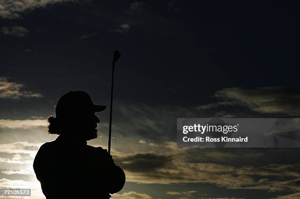 Miguel Angel Jimenez of Spain hits balls on the practice range after competing in the Second Round of The Alfred Dunhill Links Championship at The...