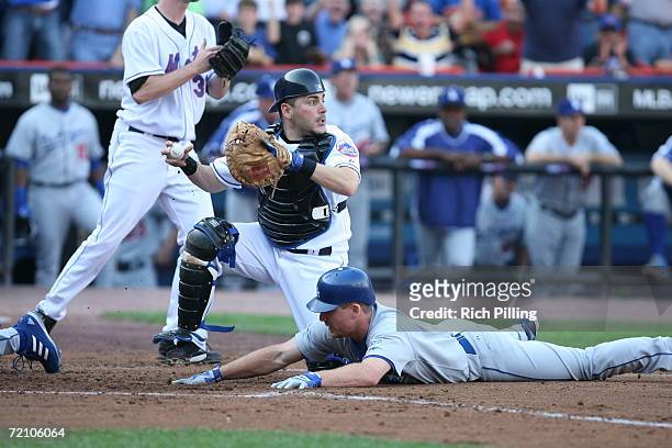 Paul LoDuca of the New York Mets tagging out J. D. Drew of the Los Angeles Dodgers during the National League Division Series game against the Los...