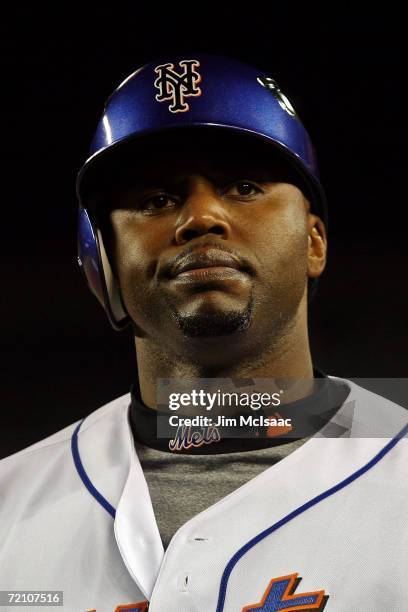 Cliff Floyd of the New York Mets reacts to a near home run against the Los Angeles Dodgers during game two of the National League Division Series at...