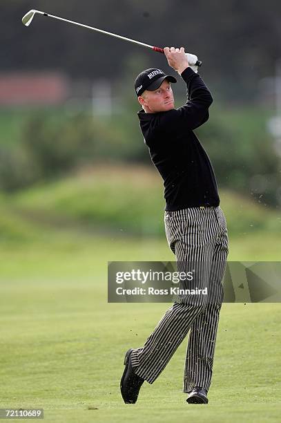 Simon Dyson of England plays his second shot to the second green during the third round of the Alfred Dunhill Links Championship on the Old Course on...