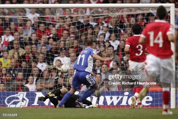 Robert Vittek of Slovakia scores the 5th goal during the EURO 2008 Group D qualifying match between Wales and Slovakia at The Millennium Stadium on...