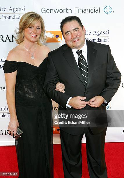 Alden Lovelace and Emeril Lagasse arrive at the 11th annual Andre Agassi Charitable Foundation's Grand Slam benefit concert at the MGM Grand Garden...