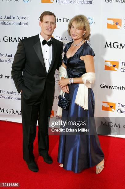 Chairman, President and CEO of Genworth Financial, Inc. Michael D. Fraizer and wife Elizabeth Fraizer arrive at the 11th annual Andre Agassi...