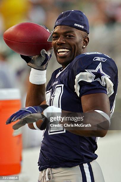 Terrell Owens of the Dallas Cowboys throws a ball on the sidelines during a game against the Philadelphia Eagles at Lincoln Financial Field on...