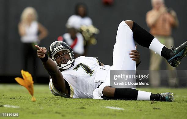 Quarterback Byron Leftwich of the Jacksonville Jaguars points toward referee Tony Corrente and calls for a penalty on a late hit against the New York...