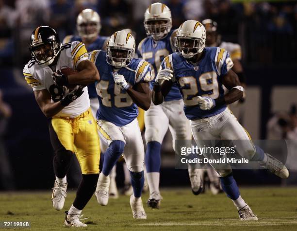 Wide Receiver Hines Ward of the Pittsburgh Steelers runs against the defense of the San Diego Chargers in the Steelers' 23-13 loss to the Chargers...