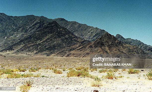 This file photo dated 29 May, 1998 shows a view of the Chaghi district hill in Chattar, some 30 to 35 kilometers from the site of nuclear blasts that...