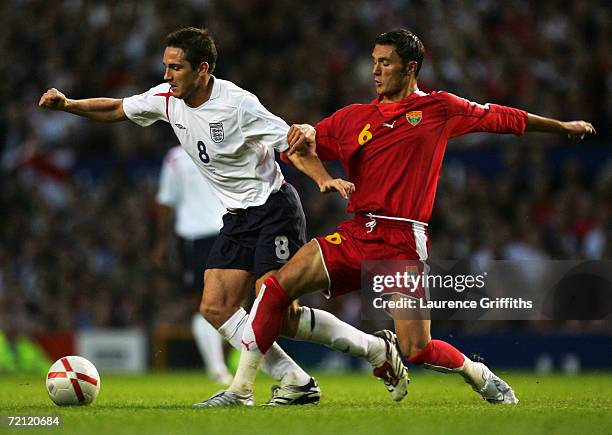 Frank Lampard of England battles with Aleksandar Mitreski of Macedonia during the Euro 2008 Qualifying match between England and Macedonia at Old...