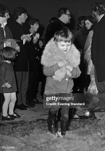 Little girl dancing in jelly during the 'Psychedelic Sale At The Roundhouse' - an event organized by the Arts Lab at the Roundhouse in Chalk Farm,...