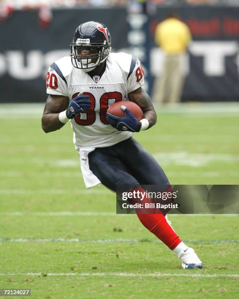 Wide Receiver Andre Johnson of the Houston Texans runs after a catch during a game against the Washington Redskins at Reliant Stadium on September...