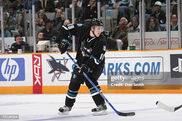 Matt Carle of the San Jose Sharks skates with the puck during a game against the St. Louis Blues on October 5, 2006 at the HP Pavilion in San Jose,...