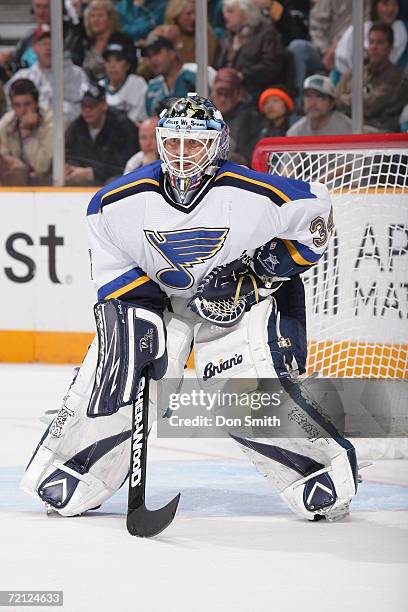 Manny Legace of the St. Louis Blues follows the action during a game against the San Jose Sharks on October 5, 2006 at the HP Pavilion in San Jose,...