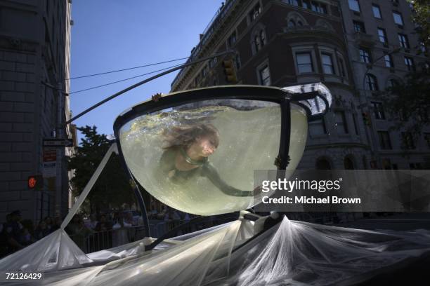 Irina Losnjykoua, whose group was from the Italian province of Varese, swims and dances to opera music by Francesco Paolo Tosti while inside a fish...