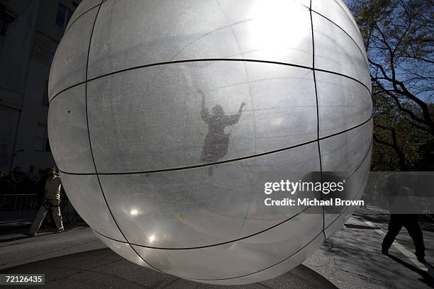 Member of the Italian group Studio Festie is rolled inside a gigantic ball down Fifth Avenue during the Columbus Day Parade October 9, 2006 in New...