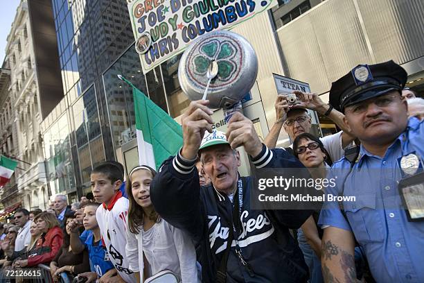 Freddy "Sez" Schuman cheers for Senator Hillary Rodham Clinton as she walks down Fifth Avenue during the Columbus Day Parade October 9, 2006 in New...