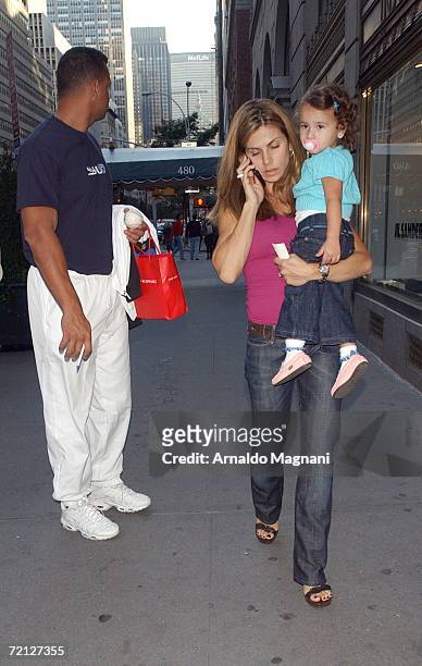 New York Yankees third baseman Alex Rodriguez, his wife Cynthia and daughter Natasha Alexander walk in Midtown October 9, 2006 in New York City.