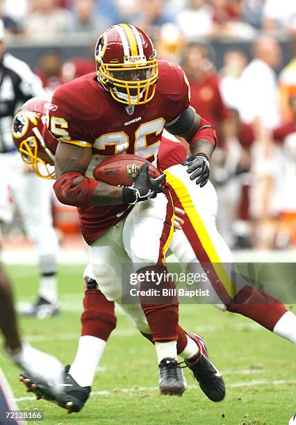 Running back Clinton Portis of the Washington Redskins runs the ball during the game against the Houston Texans at Reliant Stadium on September 24,...