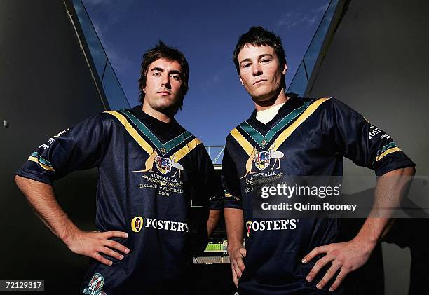 Kade Simpson of Carlton and Andrew Raines of Richmond pose together after being named in the Australian International Rules team at the Telstra Dome...