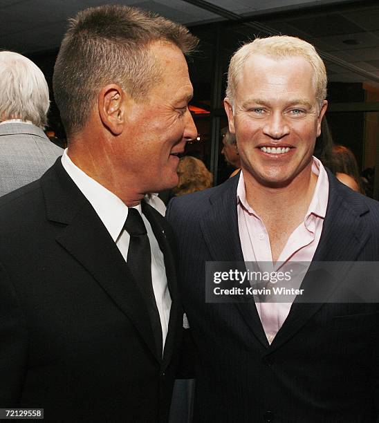 Actors Robert Patrick and Neal McDonough pose at the afterparty for the premiere of Paramount's "Flags Of Our Fathers" at the Academy of Motion...