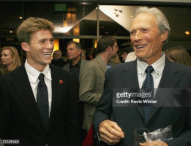 Actor Scott Reeves and his father, actor/director Clint Eastwood talk at the afterparty for the premiere of Paramount's "Flags Of Our Fathers" at the...