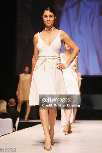 Model walks the runway wearing a dress by designer Surily Goel at the "Celebration of Indian Fashion & Film" at the National Gallery of Victoria...